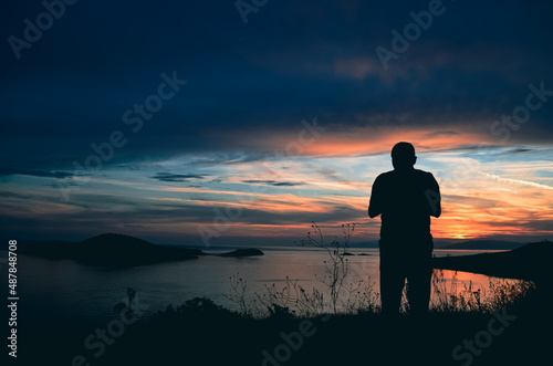 silhouette of a man on sunset