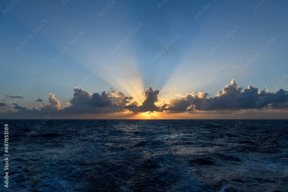 Beautiful seascape - waves and sky with clouds with beautiful lighting. Golden hour. Beautiful seascape - waves and sky with clouds with beautiful lighting. Golden hour.