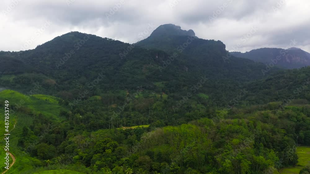 Aerial view of Mountains with rainforest and agricultural land in a mountainous province in Sri Lanka. Aerial view of Mountains with rainforest and agricultural land in a mountainous province in Sri Lanka.