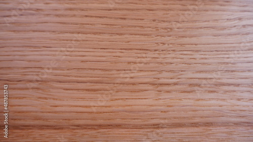 Full frame brown wood background showing woodgrain detail with copyspace