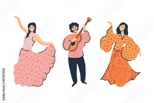 Two gypsies dancing in beautiful dresses. Gypsy plays guitar