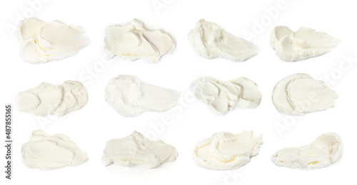 Tasty fresh cream cheese on white background
