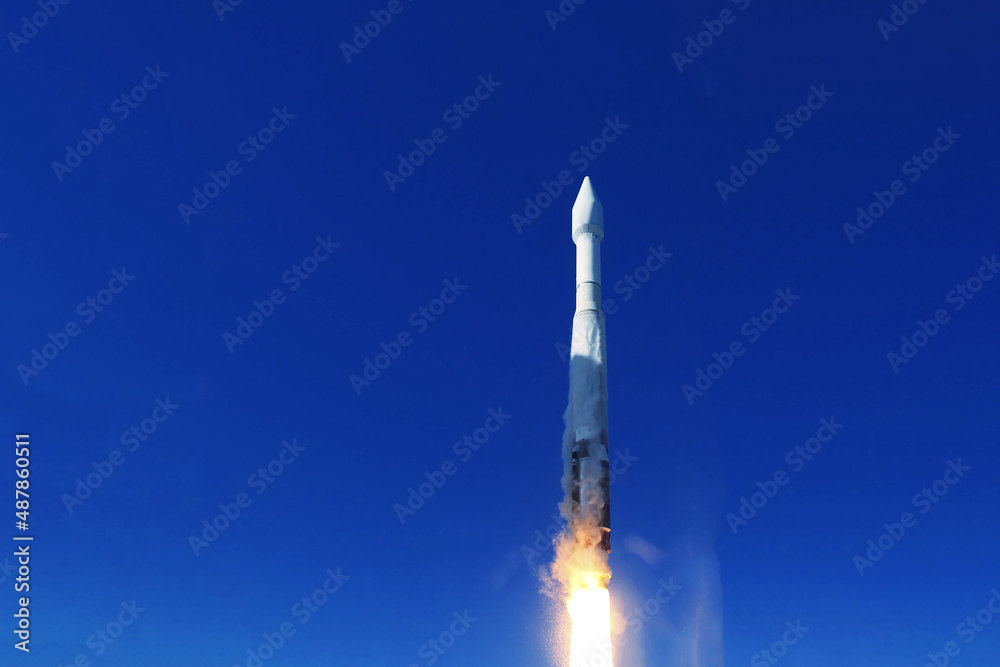 Take off space rocket on a background of blue sky and sun. Elements of this image were furnished by NASA