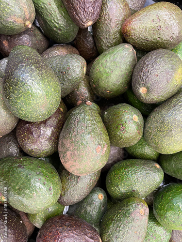 avocados on the shelves at the store
