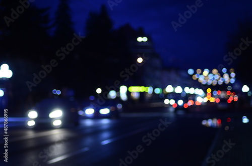 Blur view of night city © Yurii Andreichyn