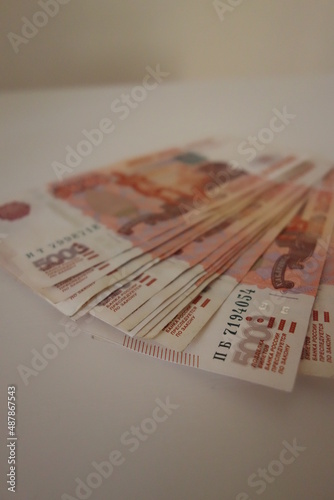 money on a white background. Russian currency.Banknotes in denominations of five thousand rubles. High quality photo