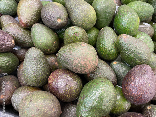 avocados on the shelves at the store