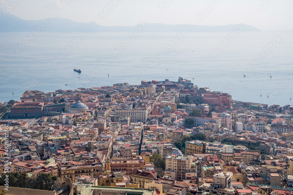 Top panoramic view of historic Naples and the Gulf of Naples. Mount Vesuvius and historical landmarks of Naples Italy