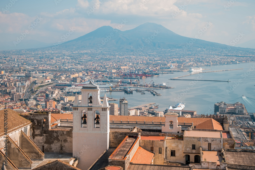 Top panoramic view of historic Naples and the Gulf of Naples. Mount Vesuvius and historical landmarks of Naples Italy