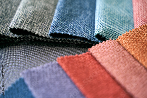 Obraz na płótnie Colorful upholstery fabric samples on the home sofa w salonie