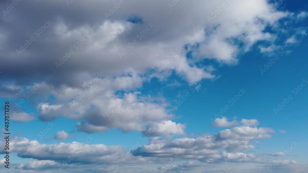 Epic skyscape view with moving right to left white clouds. High scenic layered cloudy blue heaven footage Epic skyscape view with moving right to left white clouds. High scenic layered cloudy blue heaven footage