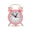 Classic pink table clock on a white background
