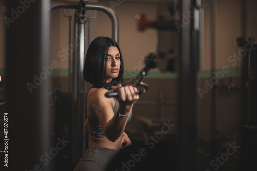 A girl training inside a gym.