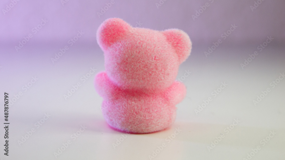 Mini pink teddy bear back facing solo Mini pink teddy bear back facing solo