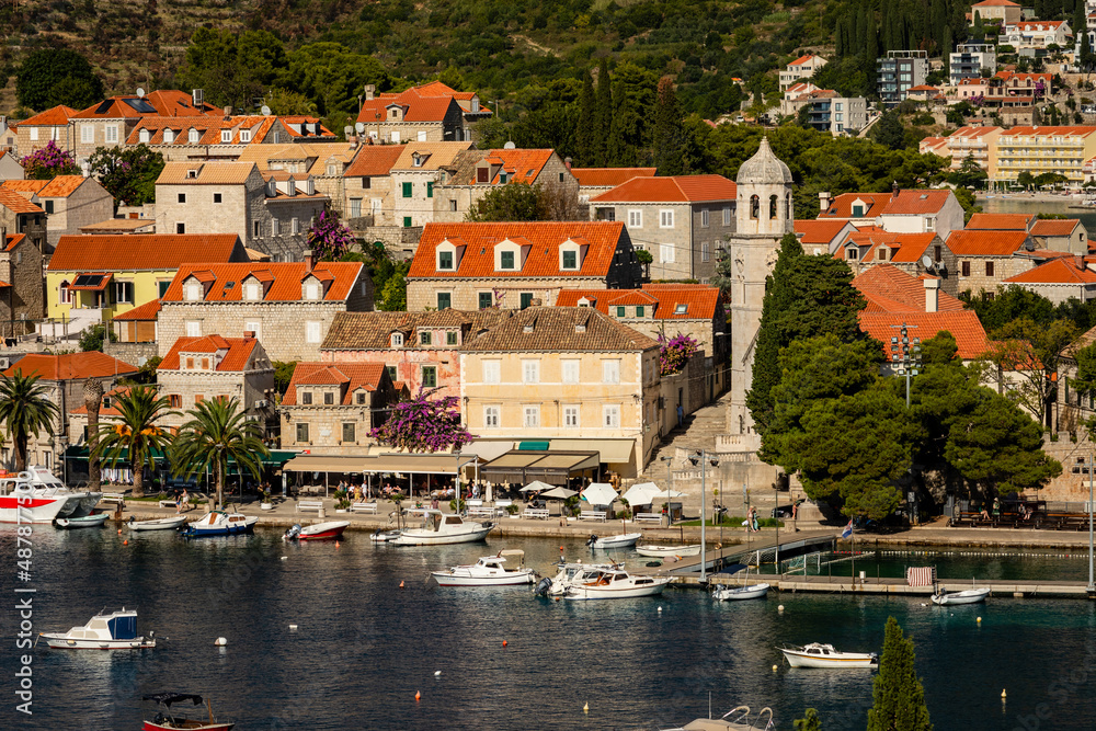 The church of Saint Nicholas towers above the waterfront of Cavtat, Croatia
