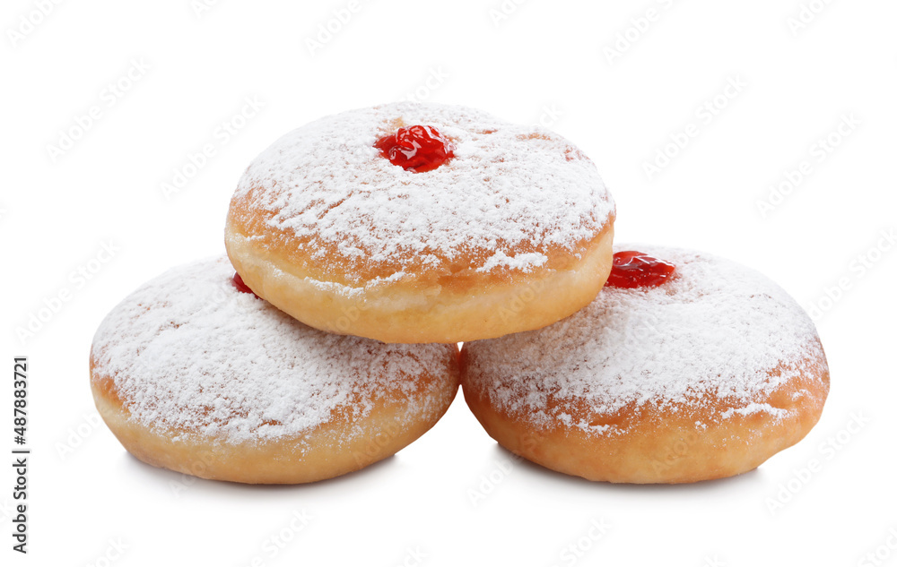 Delicious donuts with jelly and powdered sugar on white background Delicious donuts with jelly and powdered sugar on white background