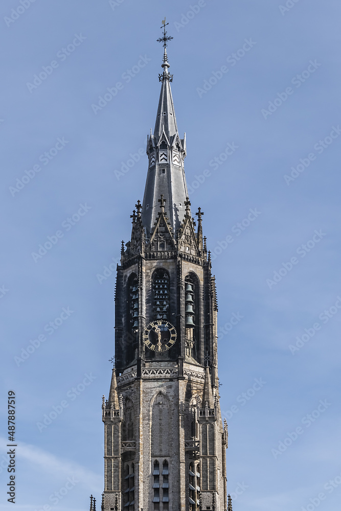 View of XV century Belfry of Nieuwe Kerk (New Church, 1396 - 1496) on Market square in Delft. New Church, with 108,5 m church tower - second highest church in the Netherlands. Delft.