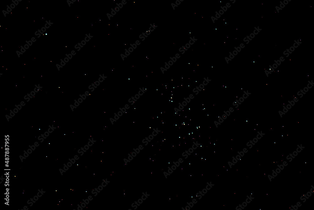 Praesepe star cluster or beehive star cluster on a dark winter night in Ohio. Also known as Messier 44 or M44 in the breast of the Cancer Constellation.