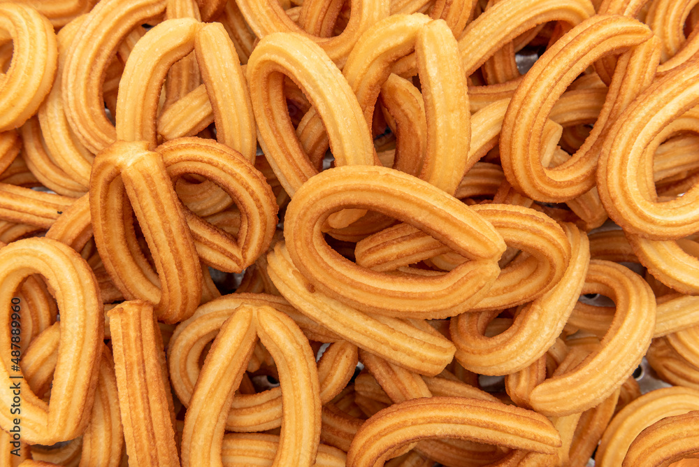 Spanish bulk breakfast churros in closeup Spanish bulk breakfast churros in closeup