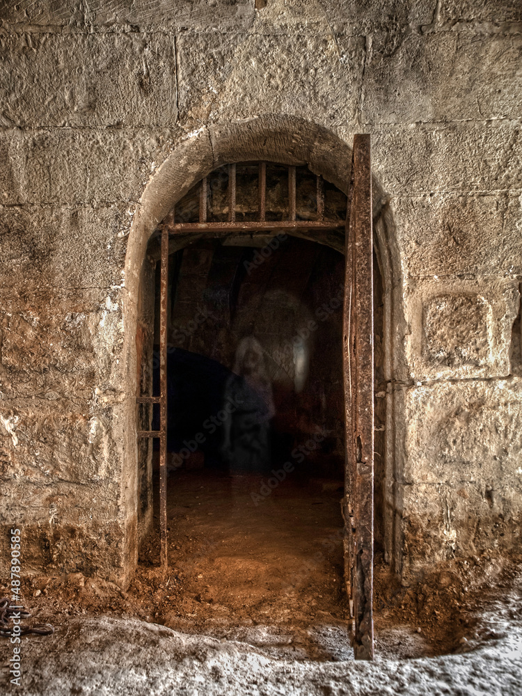 An Eerie Apparition Inside a Medieval Jail Cell