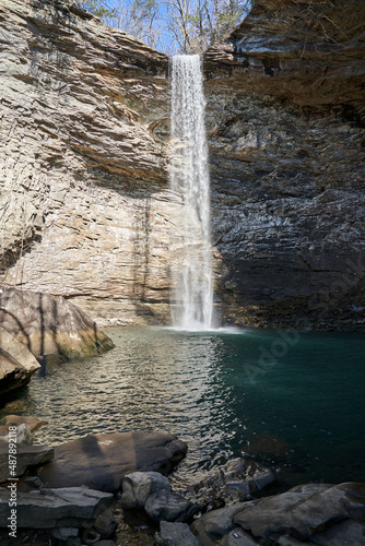 Scenic View of Cascading Waterfall in Tennessee Mountains and Shoreline Rocks