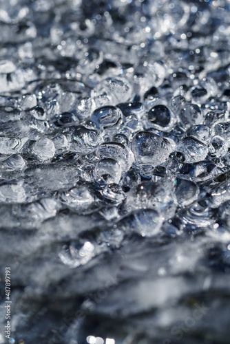 Frozen water drops side by side.