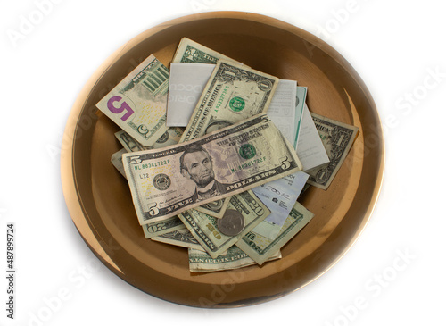 Fotografie Brass Offering Tray with Donations from Giving, Dollars, Coins, Checks, Church C