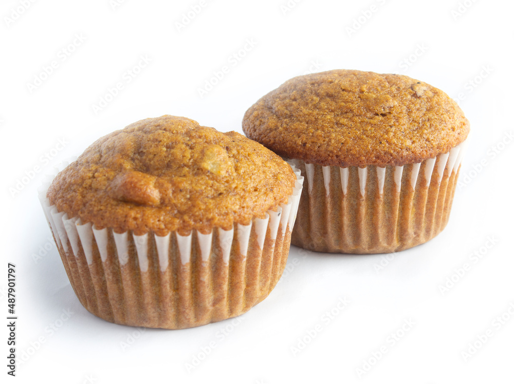 Pumpkin Spice Muffins (2) with Walnuts that were Homemade Isolated on White Pumpkin Spice Muffins (2) with Walnuts that were Homemade Isolated on White
