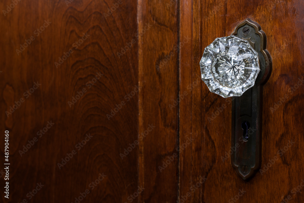 Detail of old wooden door with antique, glass, doorknob - obrazy, fototapety, plakaty 