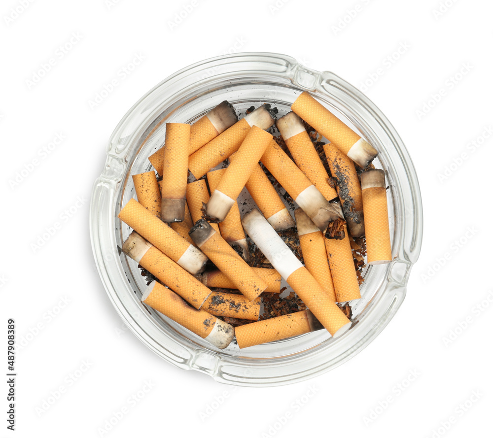 Glass ashtray full of cigarette stubs isolated on white, top view Glass ashtray full of cigarette stubs isolated on white, top view
