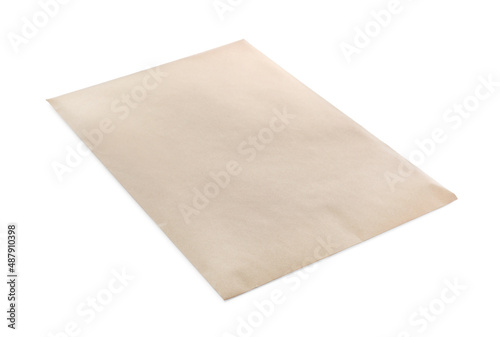 One blank kraft paper envelope isolated on white