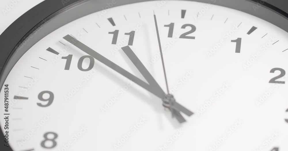 Close-up minute and second hands rotate clockwise. Quickly through the numbers on the clock face. Close-up minute and second hands rotate clockwise. Quickly through the numbers on the clock face.