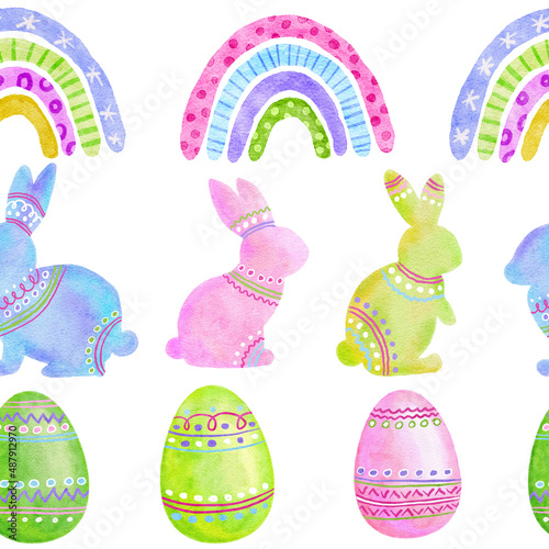 Watercolor seamless hand drawn pattern with Easter eggs bunnies rabbit raibows in pastel pink green blue colors. Spring april background for party decor wrapping paper textile. photo