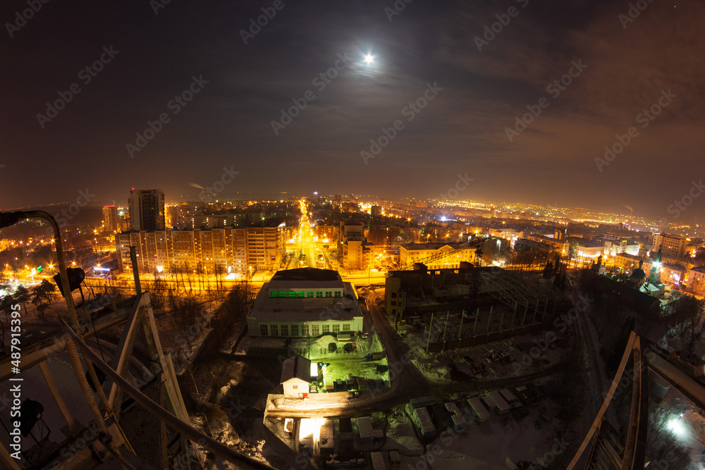 life of the night city from a height, residential areas at night, background for the calendar
