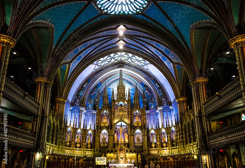 Architectural detail of Notre-Dame Basilica, a basilica in the historic district of Old Montreal. Its dramatic interior is considered a masterpiece of Gothic Revival architecture