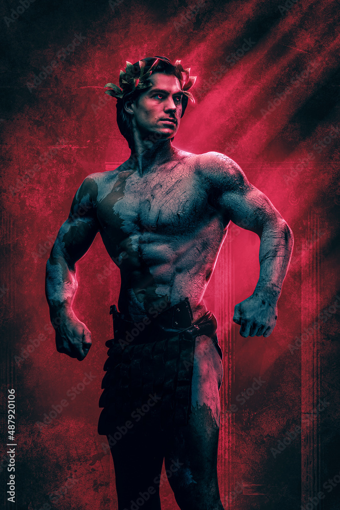 Handsome marble man with naked torso against red background Handsome marble man with naked torso against red background