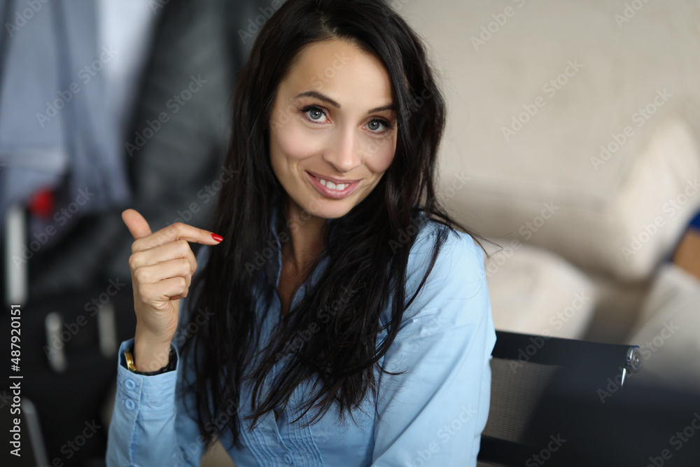 Attractive young brunette woman smiling close up