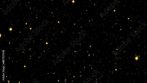 4K 3D seamless loop of shinny gold stars animation on black background. Graphic motion overlay effect loop with galaxy sky twinkling light in the space animation. Galaxy space exploration and rotation