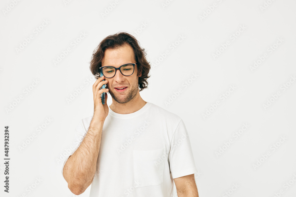 Attractive man talking on the phone technologies Lifestyle unaltered Attractive man talking on the phone technologies Lifestyle unaltered