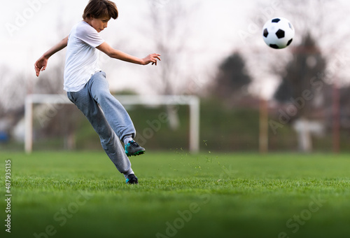  young children players match on soccer field
