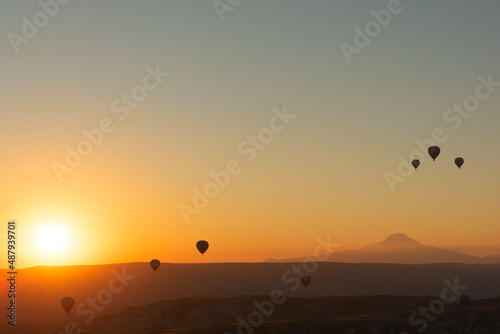 Hot air balloons in the sky during sunrise. Travel, dreams come true concept