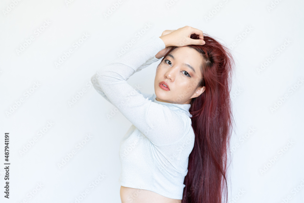 Portrait of young sexy woman with long hair isolated on white background Portrait of young sexy woman with long hair isolated on white background
