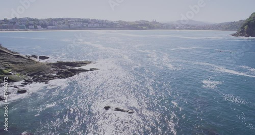 Wallpaper Mural Aerial shot of surfers on Zurriola hondartza beach San Sebastian. Torontodigital.ca