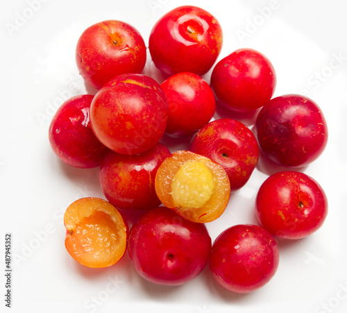 Red Camu Camu fruit  isolated on white background. Camu Camu is a fruit of South American. photo