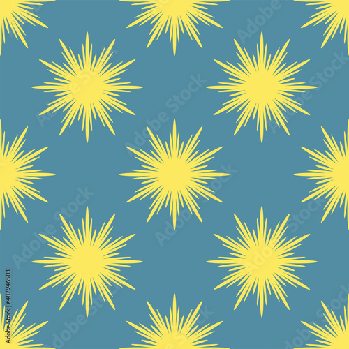 Seamless pattern with yellow abstract flowers on a blue background for packaging, fabrics, backgrounds and other products.