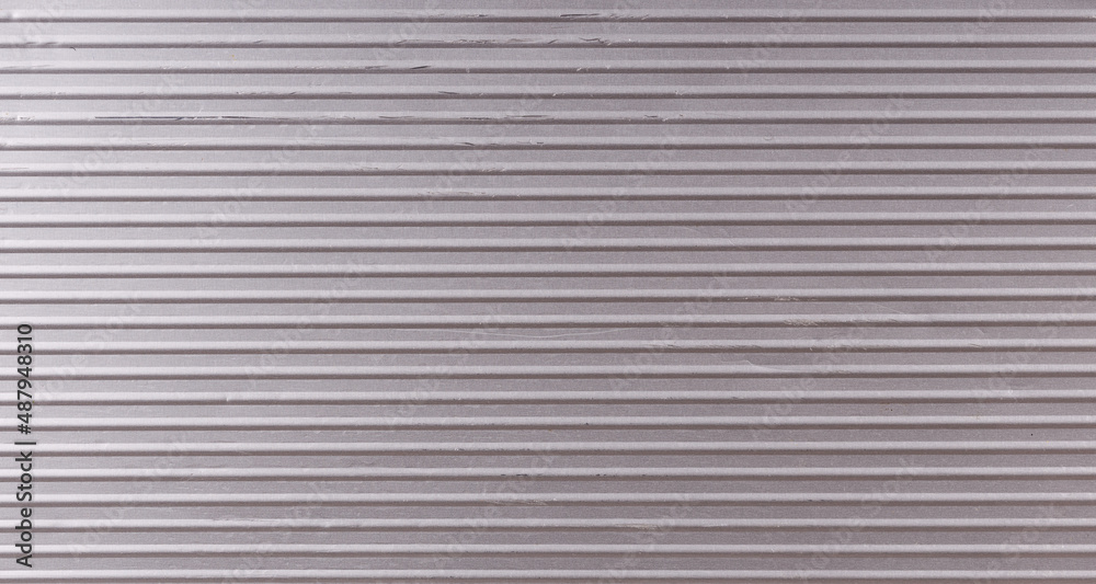 silvery metal surface with horizontal stripes and scratches silvery metal surface with horizontal stripes and scratches