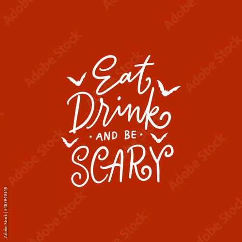 Hand lettering typography halloween day quote. Eat drink and be scary
