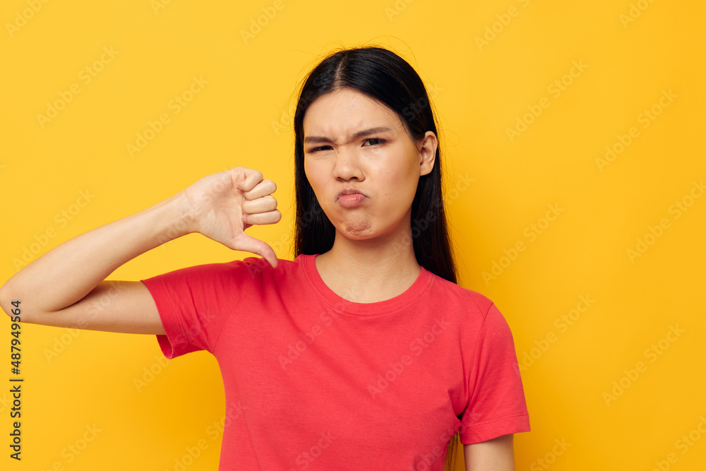 Portrait Asian beautiful young woman red t-shirts posing modern style studio model unaltered Portrait Asian beautiful young woman red t-shirts posing modern style studio model unaltered
