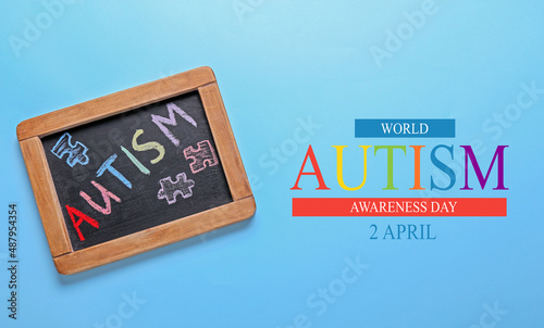 Chalkboard on blue background. World Autism Awareness day