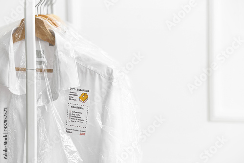 Rack with clean shirts in p...